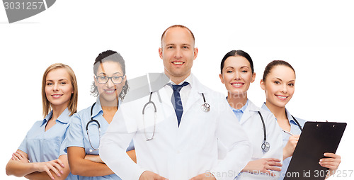 Image of group of smiling doctors with clipboard