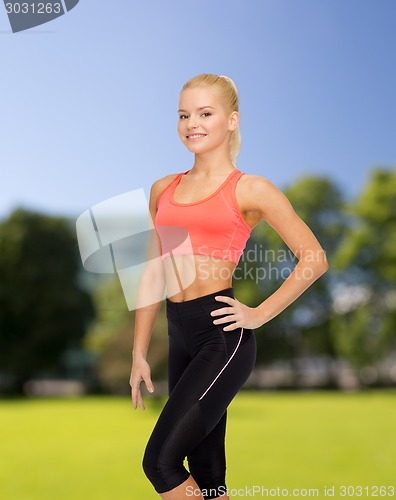 Image of beautiful athletic woman in sportswear