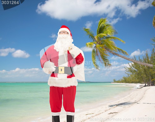 Image of man in costume of santa claus with bag