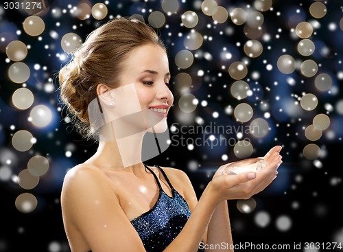 Image of smiling woman with diamond