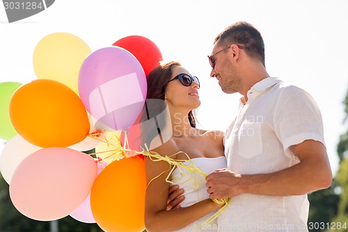 Image of smiling couple in city