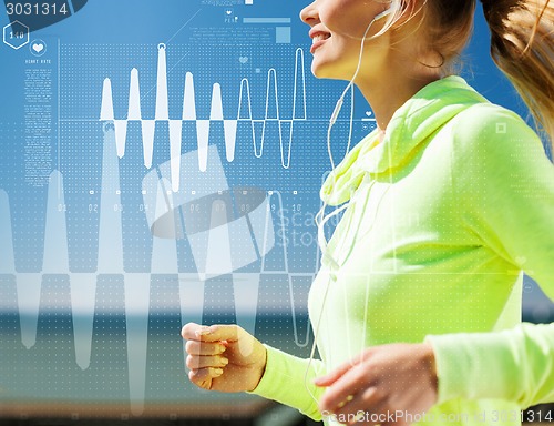 Image of smiling woman doing running outdoors