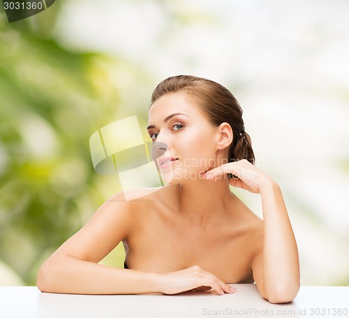 Image of smiling woman with clean perfect skin