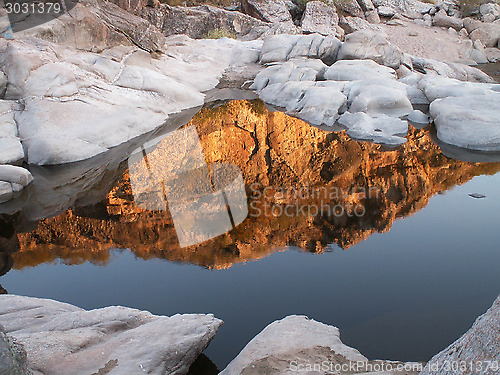 Image of Red Reflections And White Rocks Landscape