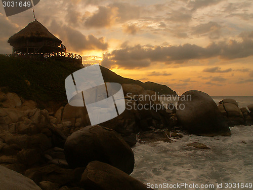 Image of Hut On A Hill At Sunset