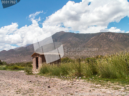 Image of Bolivian Hut By Mountain