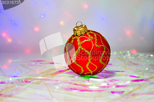 Image of Red Christmas ball on the table