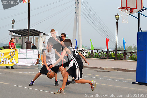 Image of Street basketball at the foot bridge (The bridge of lovers) in T