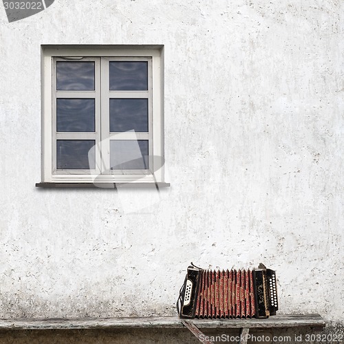 Image of accordion on the bench