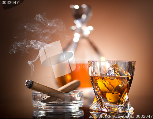 Image of Whiskey and cigar