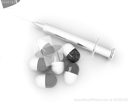 Image of Pills and syringe 