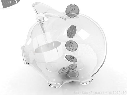Image of glass piggy bank and falling coins