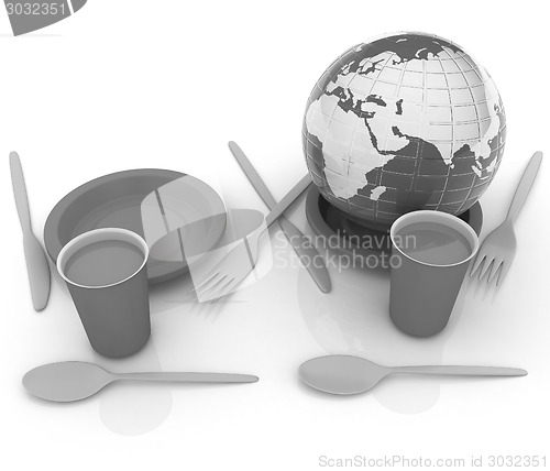 Image of Orange juice in a fast food dishes and earth