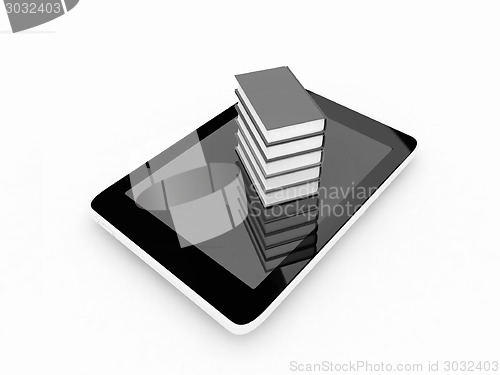 Image of tablet pc and colorful real books