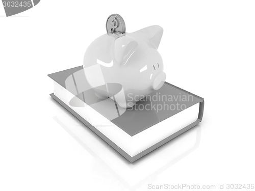 Image of Piggy Bank with a gold dollar coin on book.