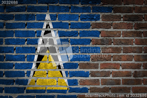 Image of Brick wall texture with flag