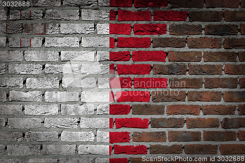 Image of Brick wall texture with flag