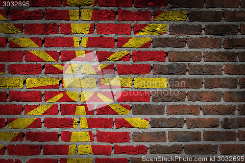 Image of Brick wall texture with flag