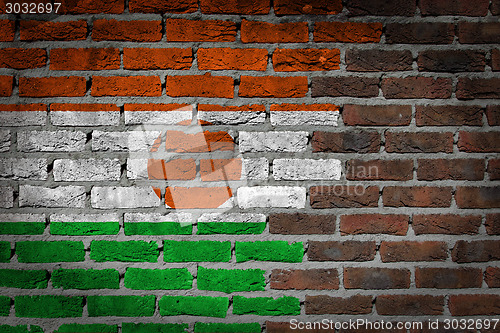 Image of Brick wall texture with flag