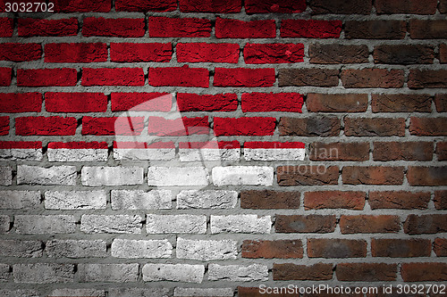 Image of Brick wall texture with flag