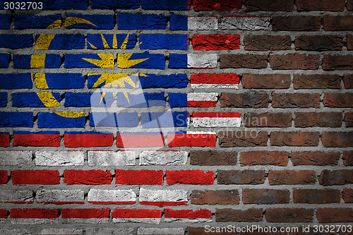 Image of Brick wall texture with flag