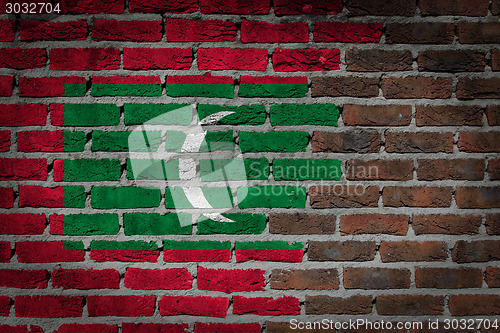 Image of Brick wall texture with flag