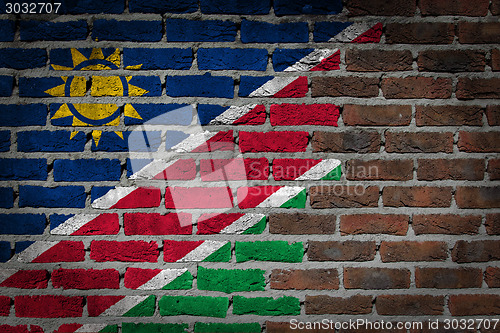 Image of Brick wall texture with flag