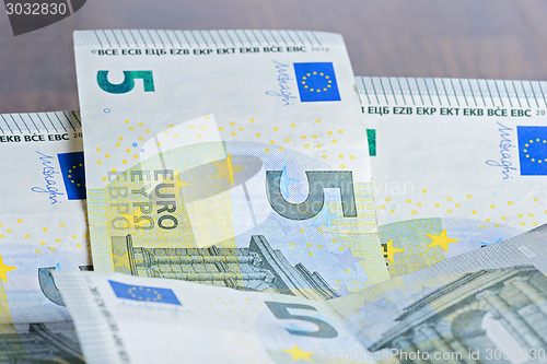 Image of Close-up of 5 Euro banknotes