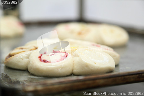 Image of dough on a conveyor belt