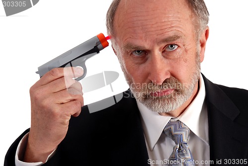 Image of Businessman dart gun