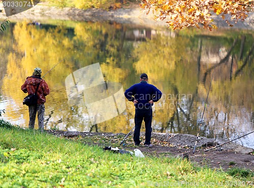 Image of fishermen on the river