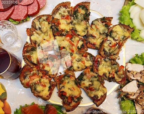 Image of Delicious sandwiches with mushrooms and cheese