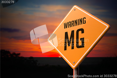 Image of MG on Warning Road Sign.