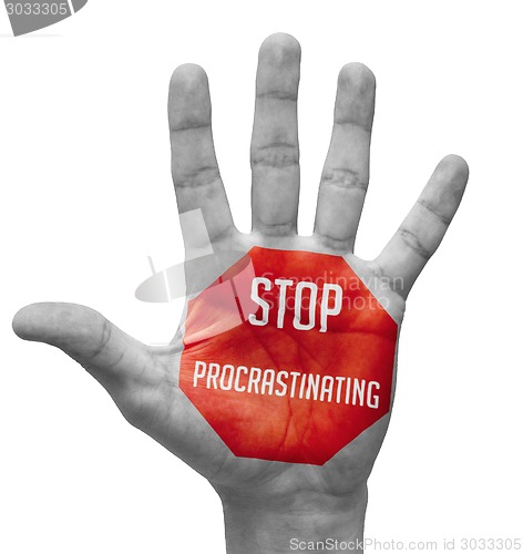 Image of Stop Procrastinating Sign Painted, Open Hand Raised.