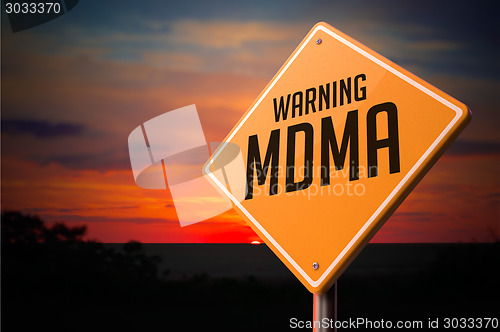 Image of MDMA on Warning Road Sign.