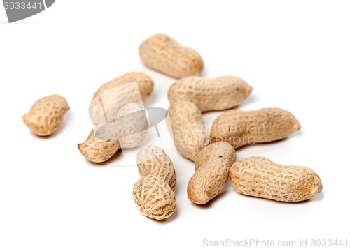 Image of Unpeeled peanuts. Selective focus.