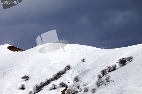Image of Off piste slope and overcast sky in windy day