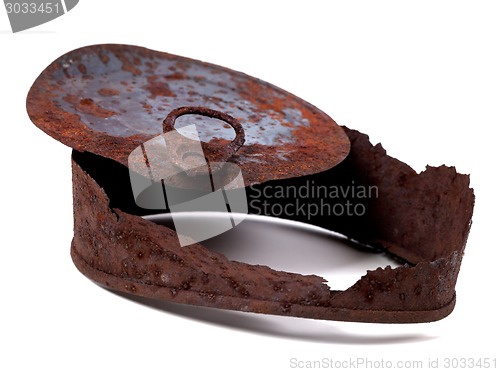 Image of Old rusty tincan on white background