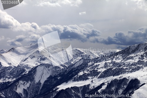 Image of Mountains in evening and cloudy sky