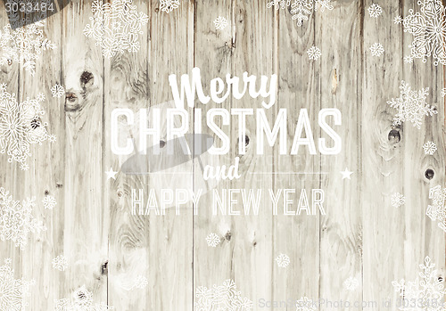 Image of Merry Christmas Greeting On Wooden Fence Texture
