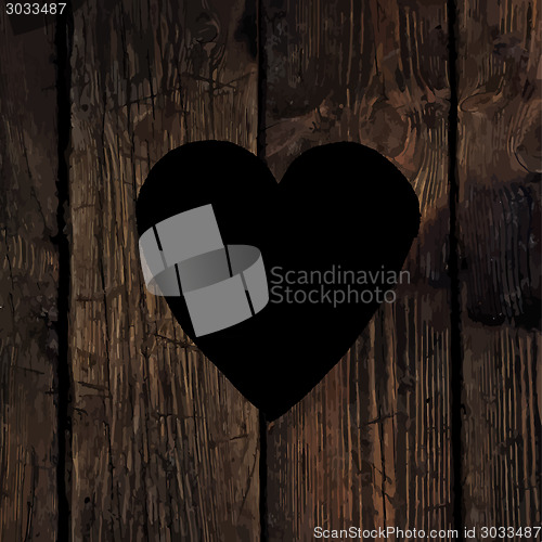 Image of Heart symbol on wooden texture.