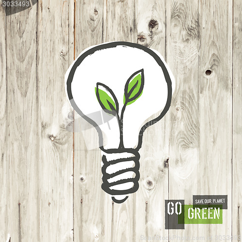 Image of Green eco energy concept, plant growing inside the light bulb, o