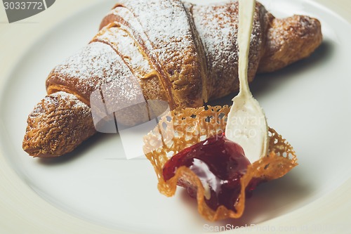 Image of breakfast with croissant