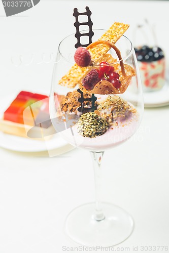 Image of Close up of chocolate truffles in elegant glasses