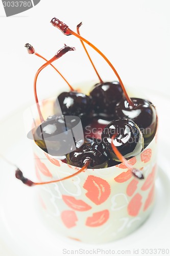 Image of vanilla dessert with cherry confiture