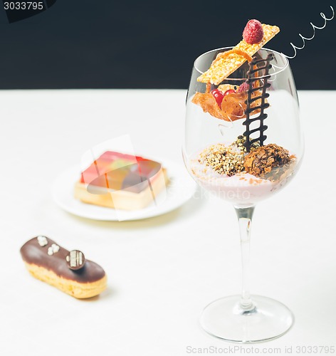 Image of Close up of chocolate truffles in elegant glasses