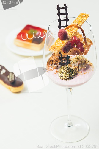 Image of Close up of chocolate truffles in elegant glasses