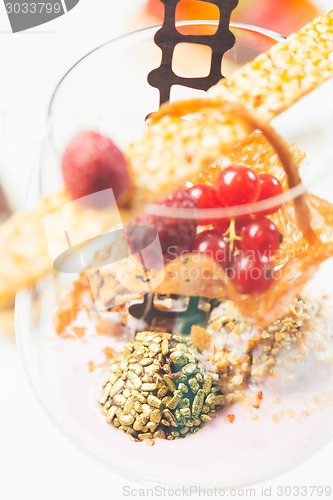 Image of Close up of chocolate truffles in elegant glasses