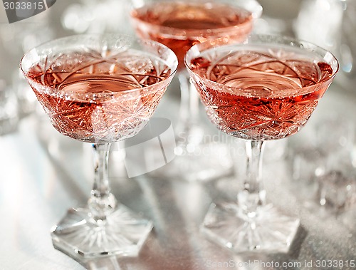 Image of glasses of pink champagne