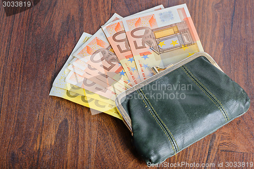 Image of Full wallet on the table